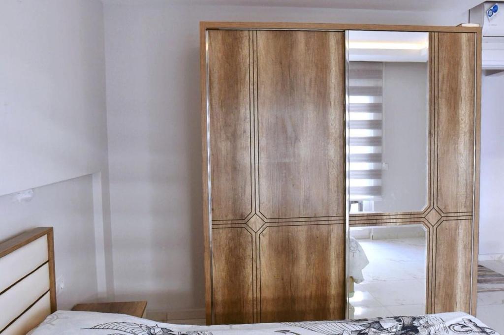 A bed or beds in a room at Arena Tower Alanya