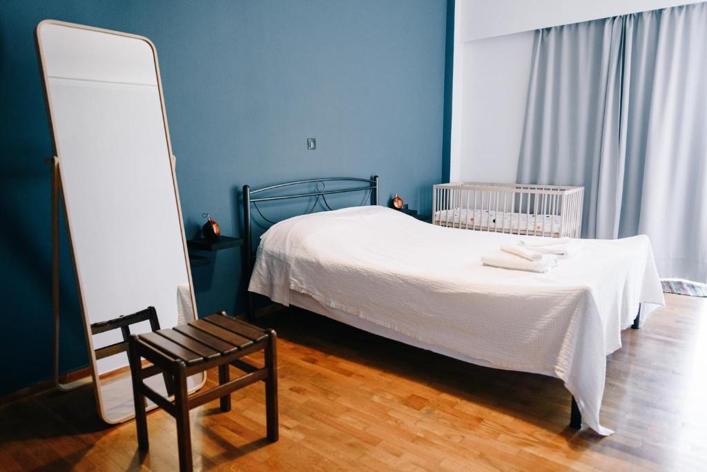 Postel nebo postele na pokoji v ubytování Toumpanakis Apartments