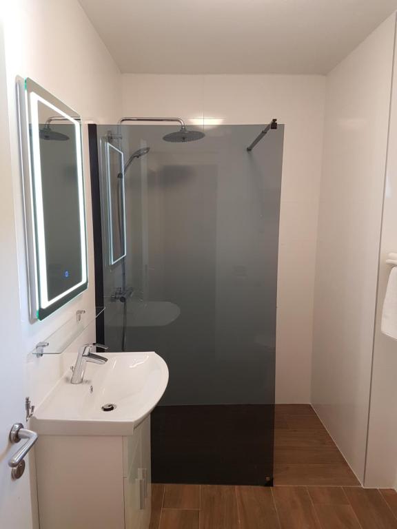 Kúpeľňa v ubytovaní Apartments Jungic, Rab