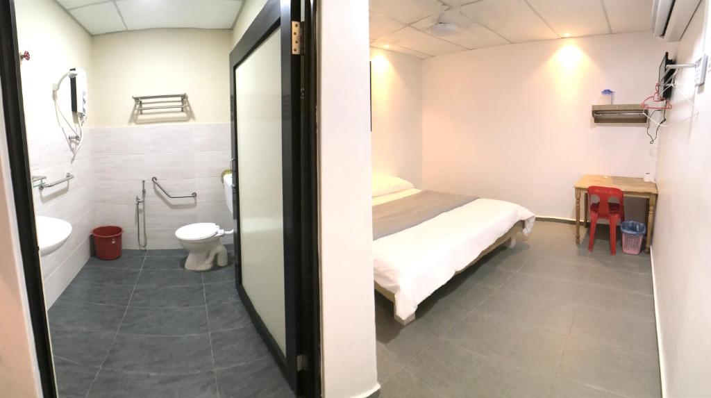 Koupelna v ubytování Grand Star Hotel
