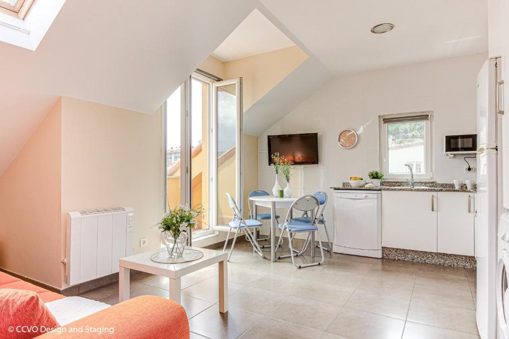 Η κουζίνα ή μικρή κουζίνα στο Apartamento Playa de Quenxe