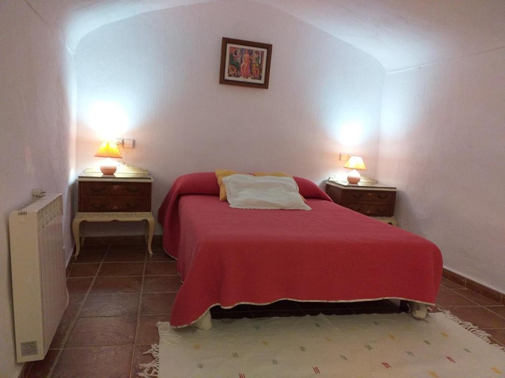 Posteľ alebo postele v izbe v ubytovaní Casa Cueva Salamandra