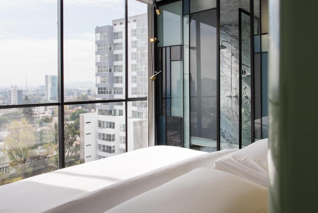 Postel nebo postele na pokoji v ubytování Casa Habita, a Member of Design Hotels