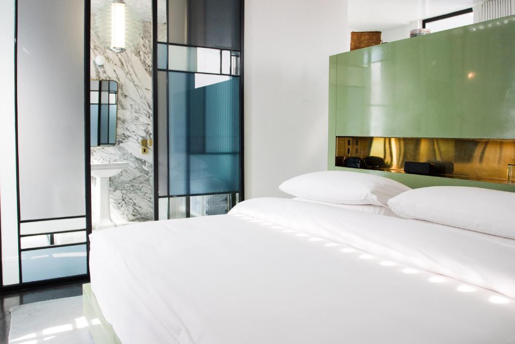 Postel nebo postele na pokoji v ubytování Casa Habita, a Member of Design Hotels