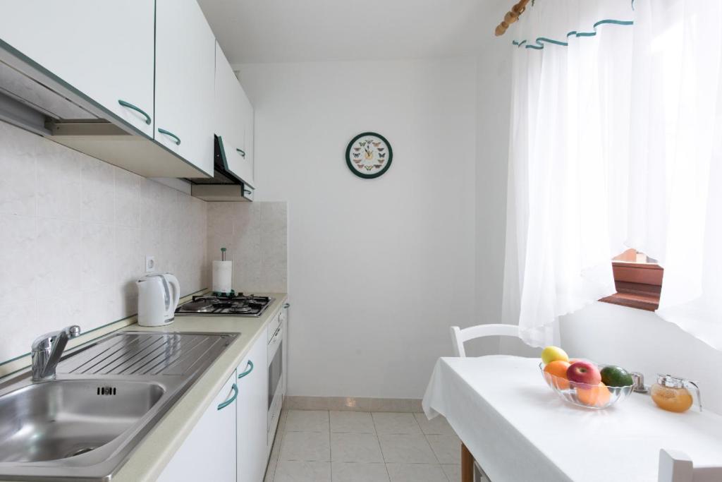 Kuchnia lub aneks kuchenny w obiekcie Apartment Calista