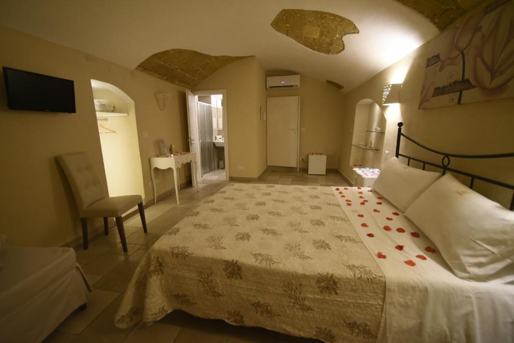 Łóżko lub łóżka w pokoju w obiekcie B&B Corte Cantalupi