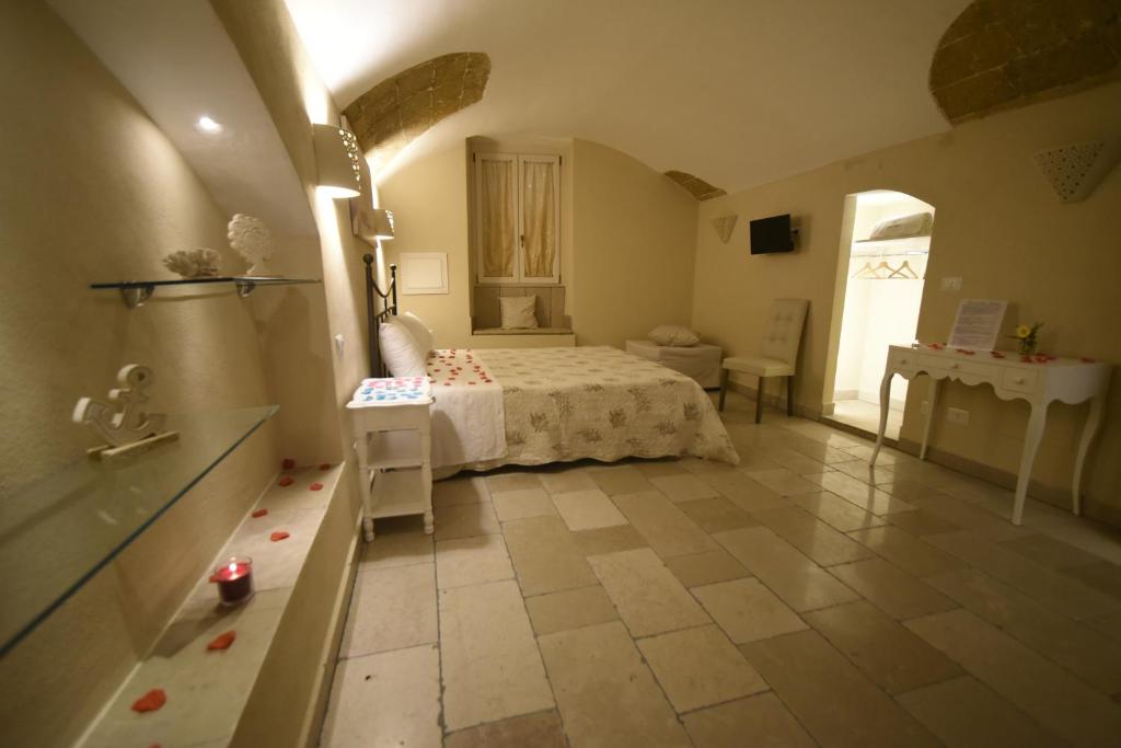 Łóżko lub łóżka w pokoju w obiekcie B&B Corte Cantalupi