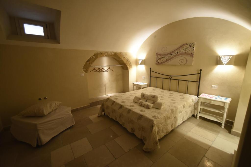 Łóżko lub łóżka w pokoju w obiekcie B&B Corte Cantalupi
