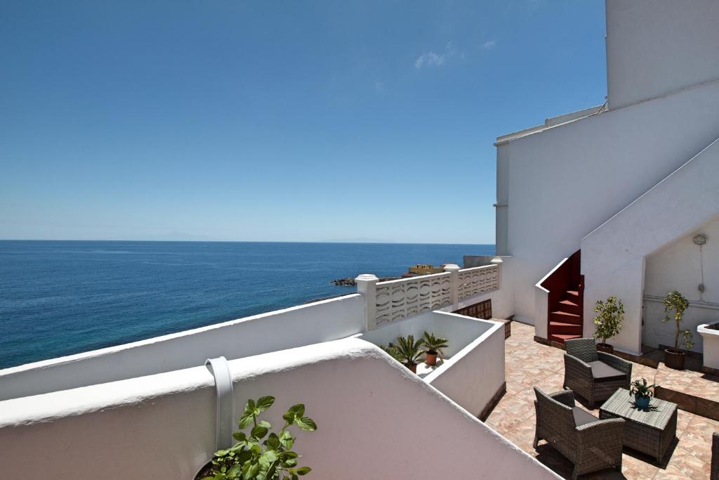 a view of the ocean from the balcony of a building at La Terraza de Juana in Santa Cruz de la Palma