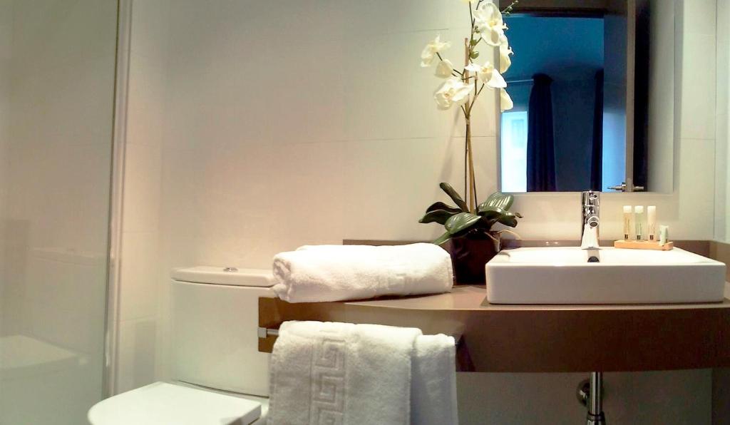 Ванная комната в Le Petit Boutique Hotel