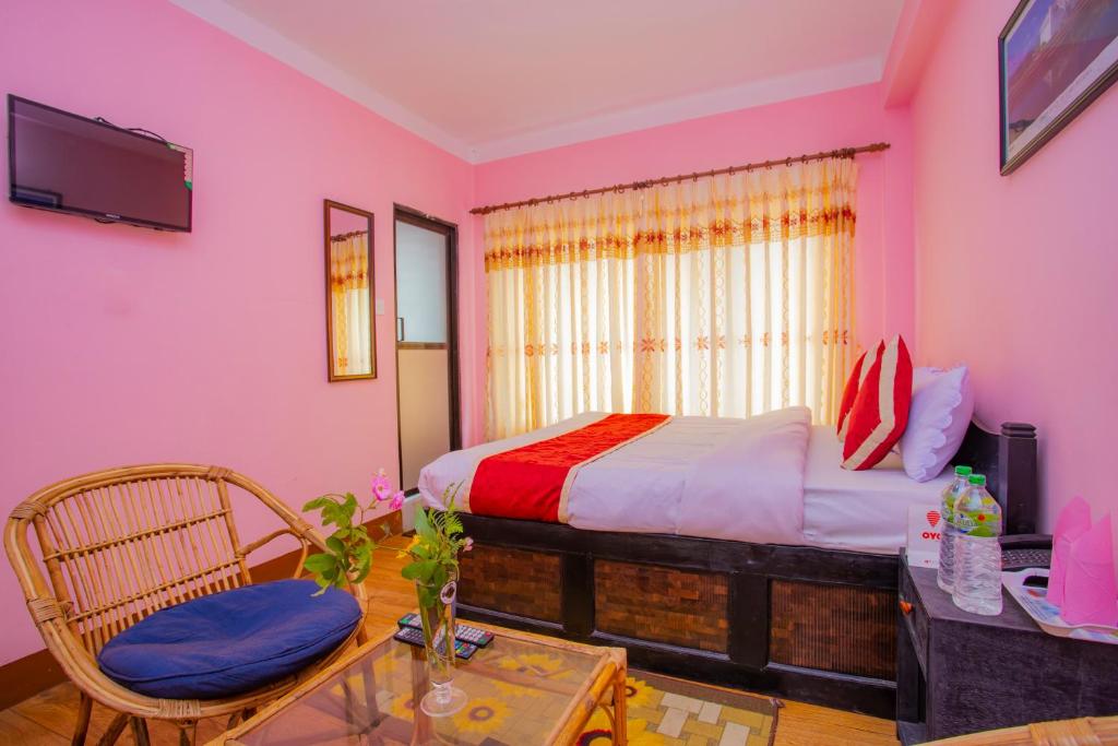 Postel nebo postele na pokoji v ubytování Sunrise Moon Beam Hotel
