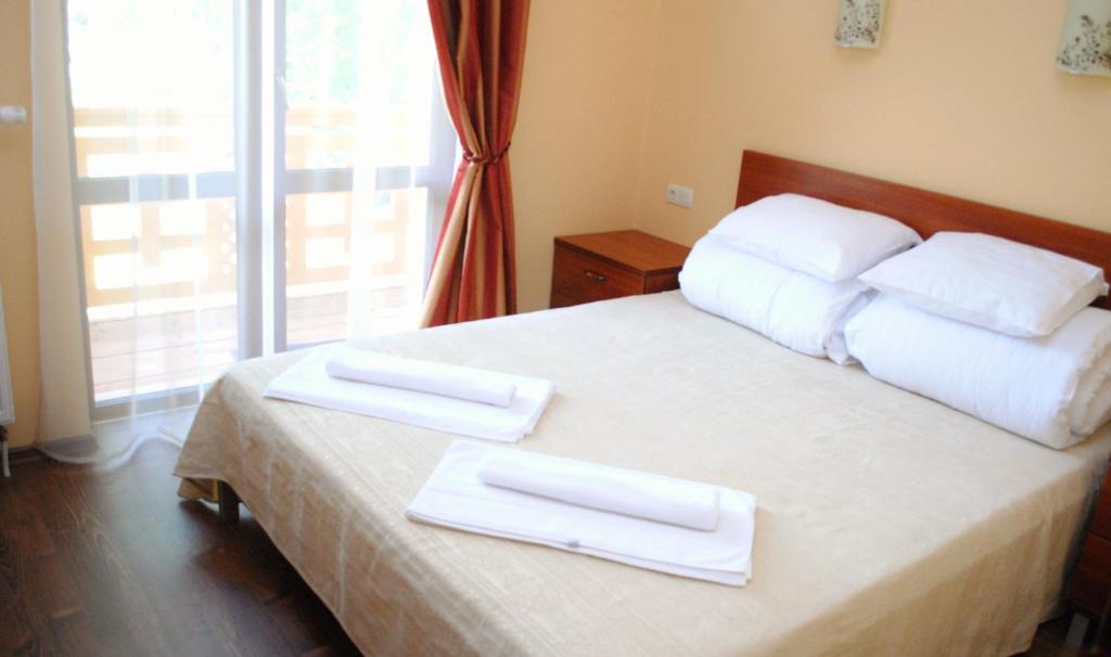Postel nebo postele na pokoji v ubytování Hotel Forward Pool&Sauna