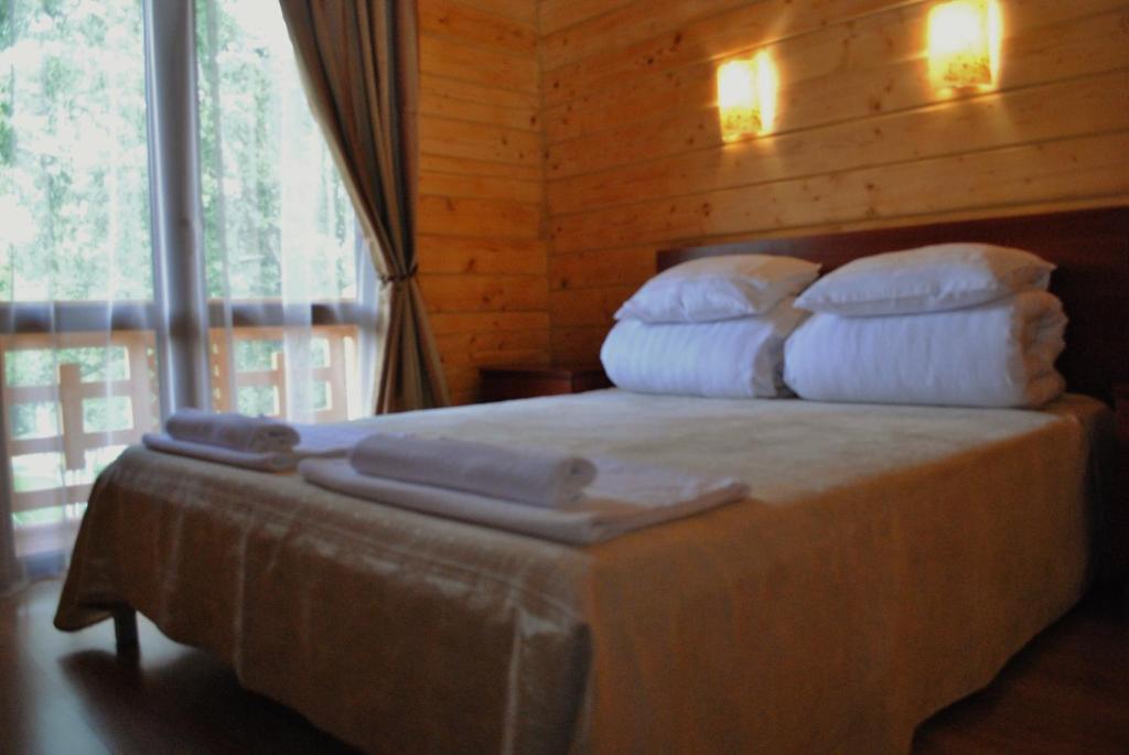 Postel nebo postele na pokoji v ubytování Hotel Forward Pool&Sauna