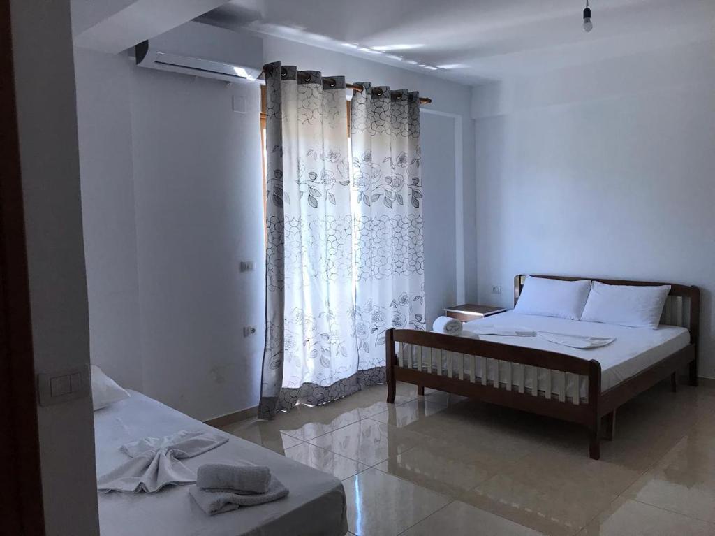Postel nebo postele na pokoji v ubytování Villa HENA