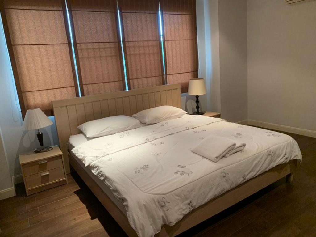Postel nebo postele na pokoji v ubytování Jomtien Beach Penthouses Condo