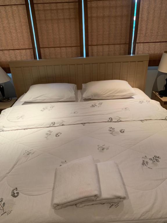 Postel nebo postele na pokoji v ubytování Jomtien Beach Penthouses Condo