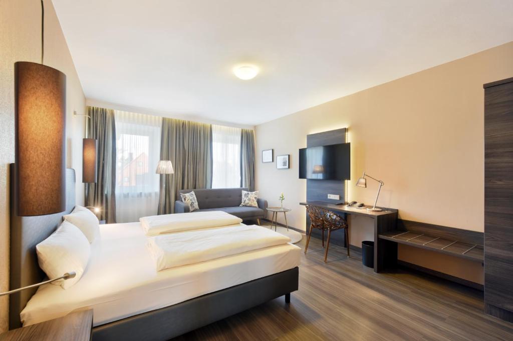 Postel nebo postele na pokoji v ubytování Hotel Säntis