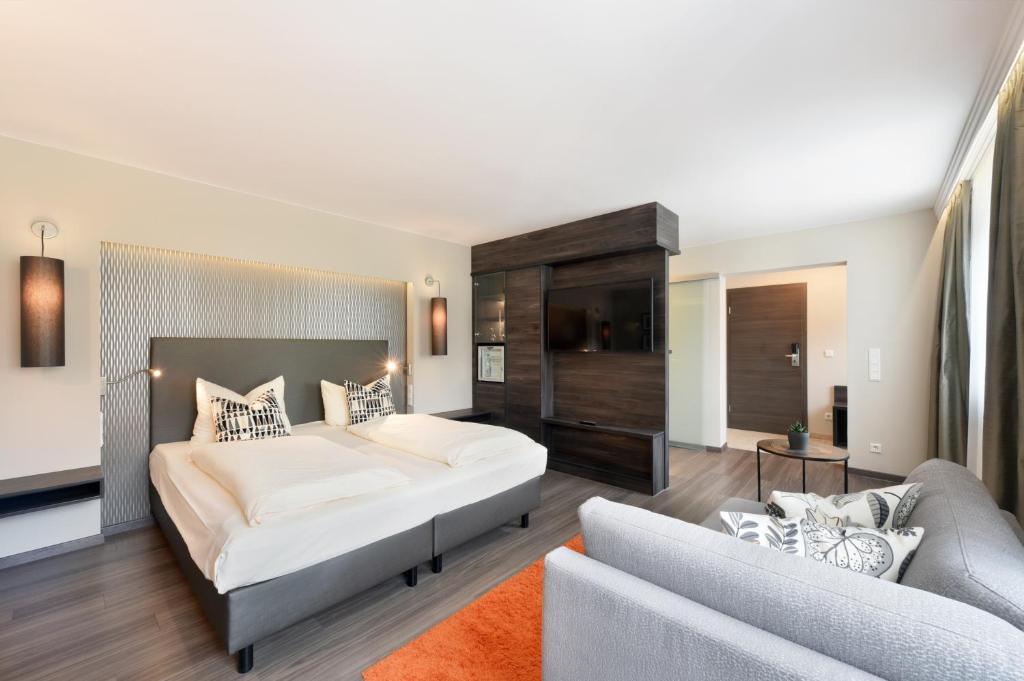 Postel nebo postele na pokoji v ubytování Hotel Säntis