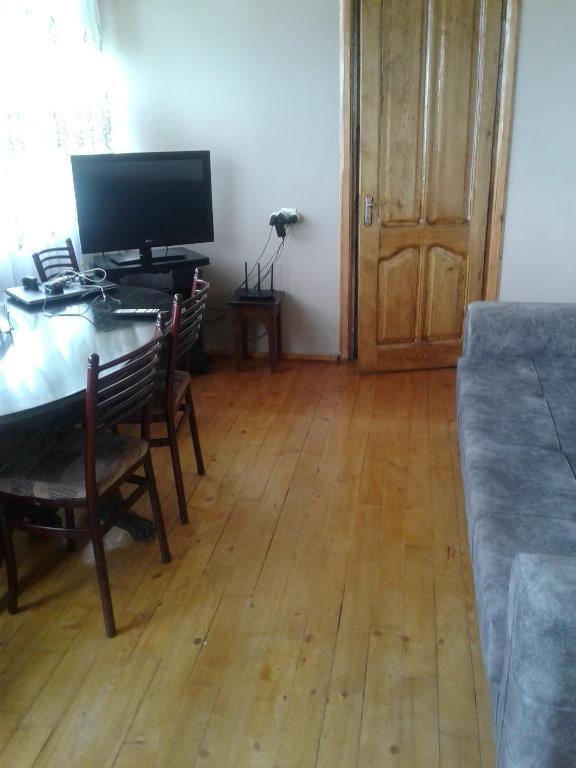 TV a/nebo společenská místnost v ubytování House Anna