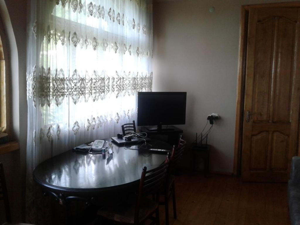TV a/nebo společenská místnost v ubytování House Anna