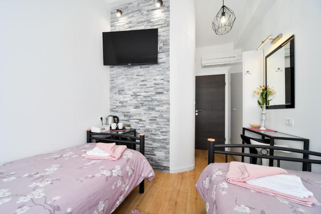 Posteľ alebo postele v izbe v ubytovaní Rooms Nekic 1
