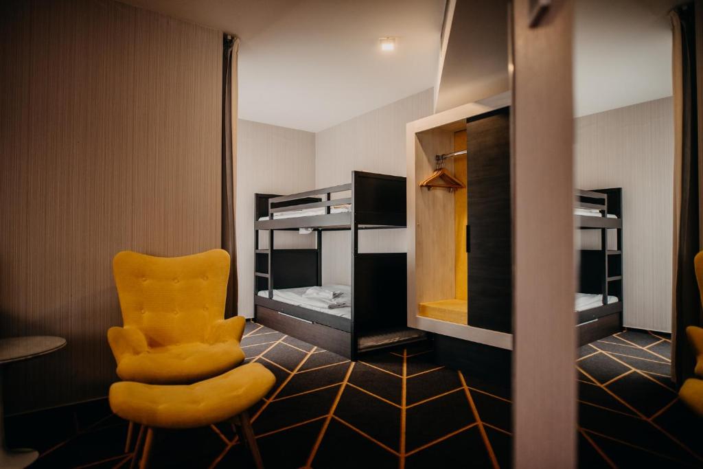 Kuchyň nebo kuchyňský kout v ubytování Science Hotel
