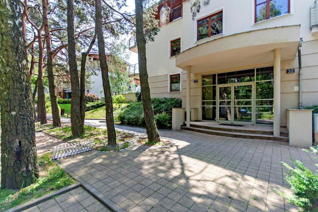 Vonkajšia záhrada v ubytovaní Przy plaży - Neptun Park by OneApartments