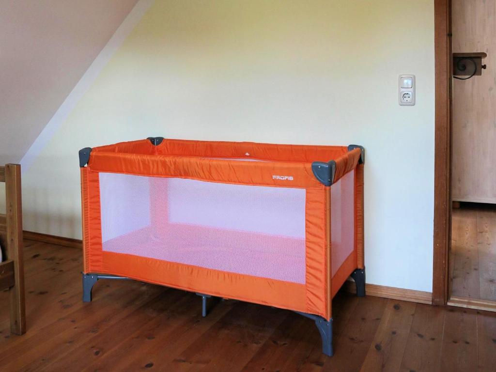 Postel nebo postele na pokoji v ubytování Holzferienhaus