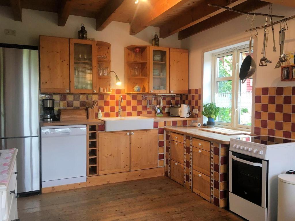 Kuchyň nebo kuchyňský kout v ubytování Holzferienhaus