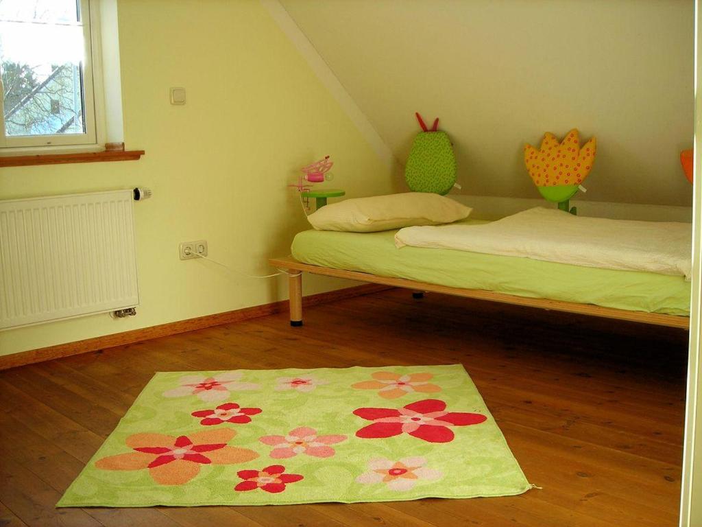 Postel nebo postele na pokoji v ubytování Holzferienhaus