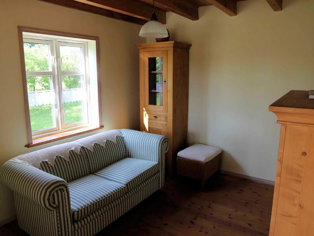 Posezení v ubytování Holzferienhaus