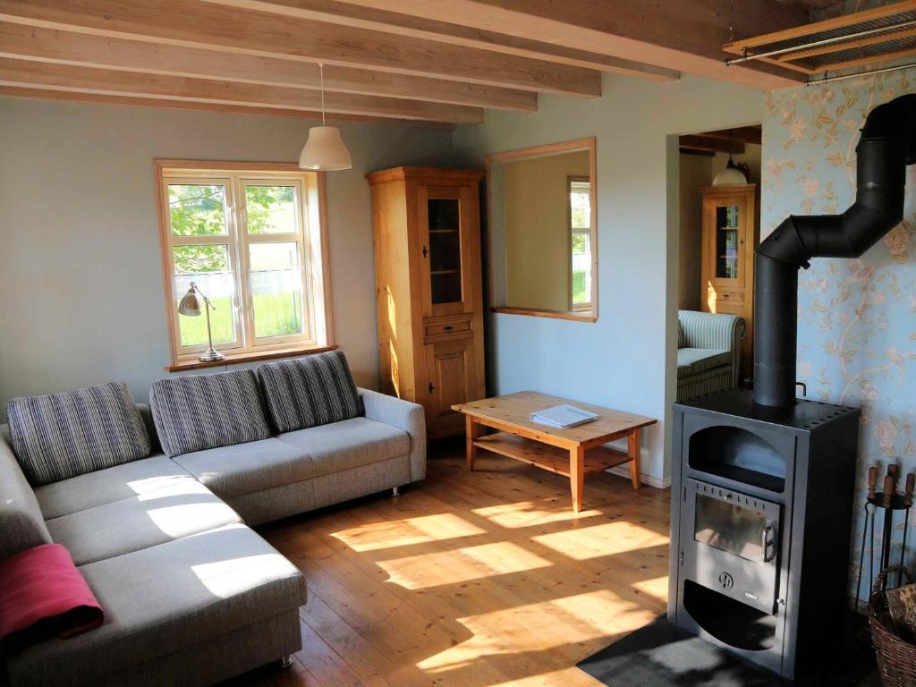 Posezení v ubytování Holzferienhaus