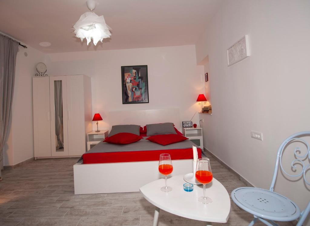 Postel nebo postele na pokoji v ubytování Apartments Barka