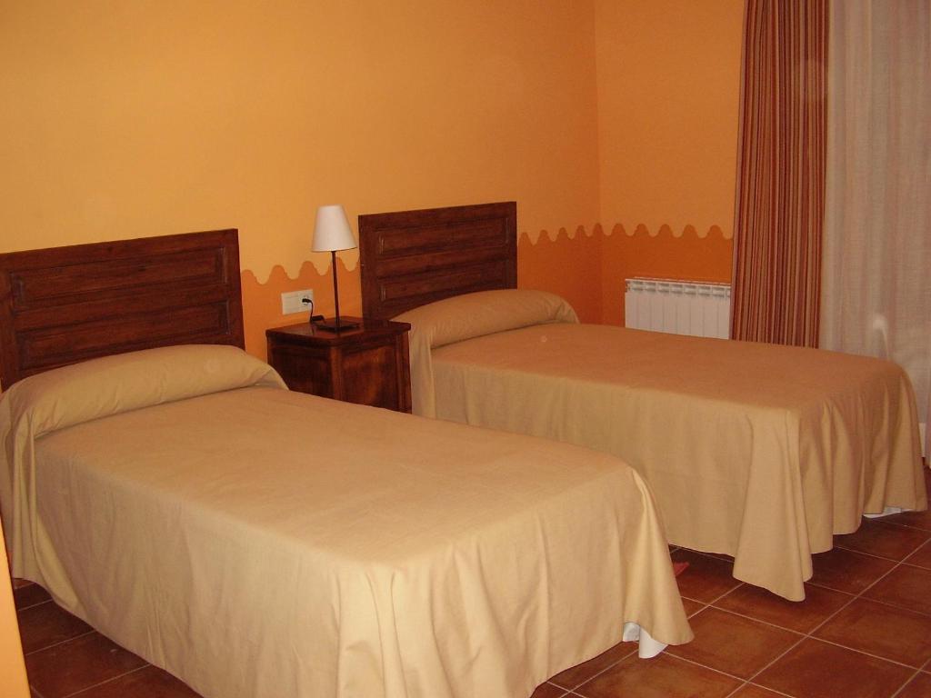 Postel nebo postele na pokoji v ubytování Casa De Los Diezmos