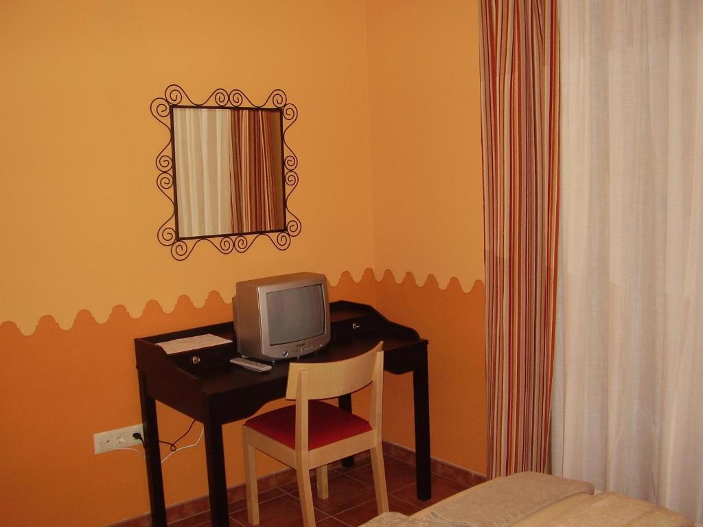 TV a/nebo společenská místnost v ubytování Casa De Los Diezmos