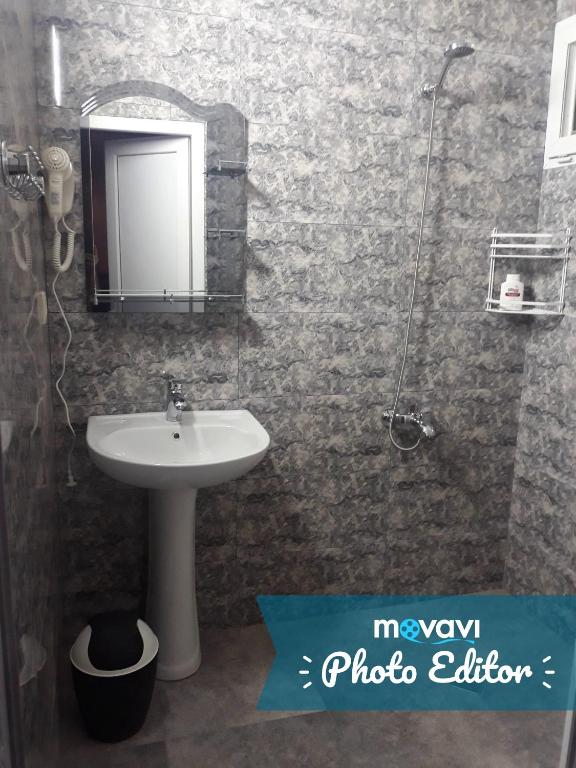Koupelna v ubytování Hotel Liza