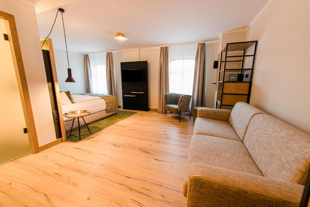 Postel nebo postele na pokoji v ubytování Weinhotel Freylich Zahn