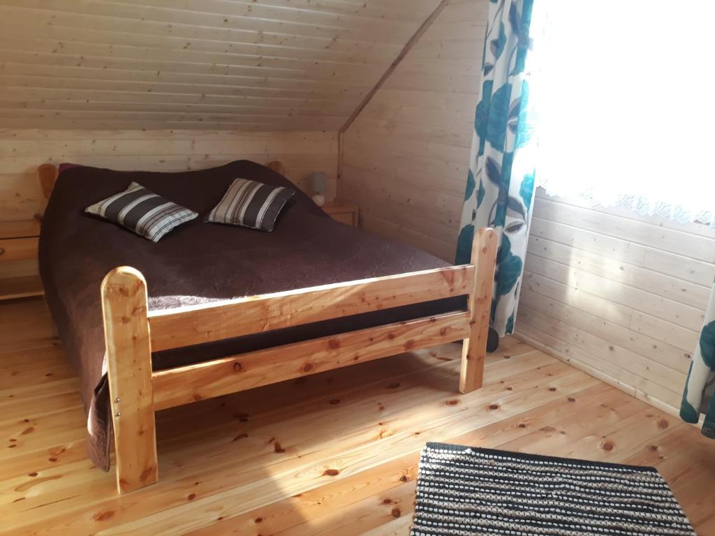 Postel nebo postele na pokoji v ubytování Pod Sokołem