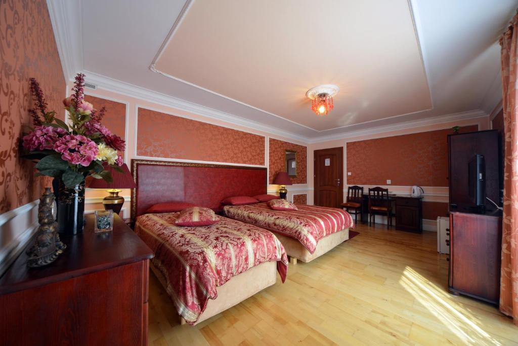 Posteľ alebo postele v izbe v ubytovaní Casablanca Pokoje i Apartamenty