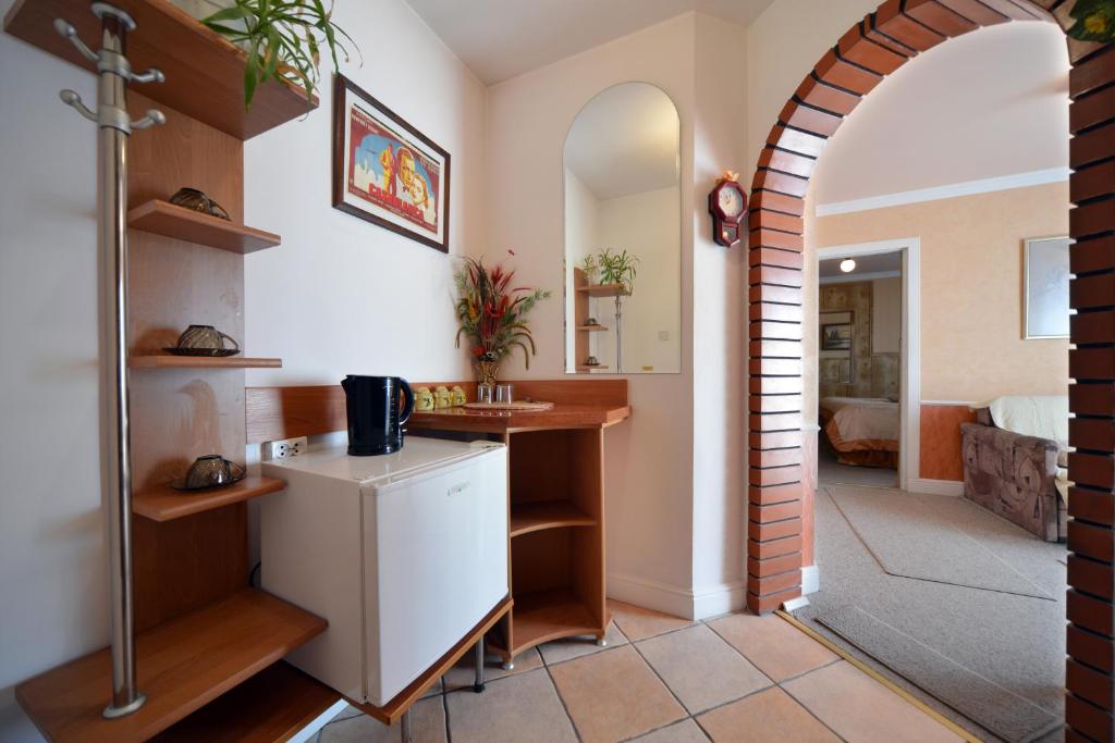 Kuchyňa alebo kuchynka v ubytovaní Casablanca Pokoje i Apartamenty