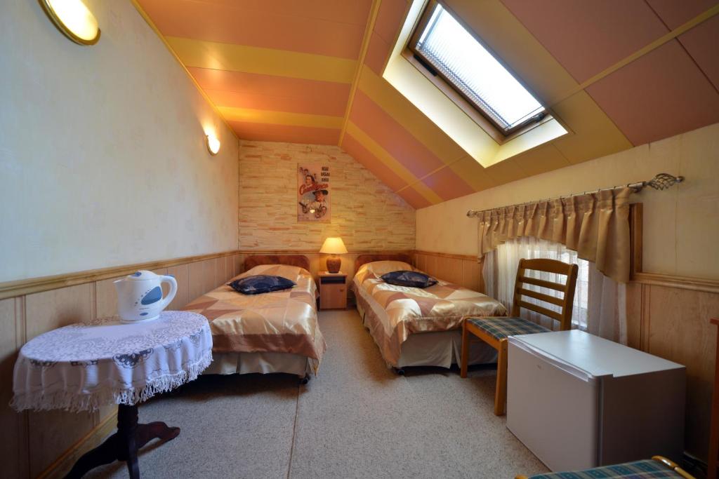 Posteľ alebo postele v izbe v ubytovaní Casablanca Pokoje i Apartamenty