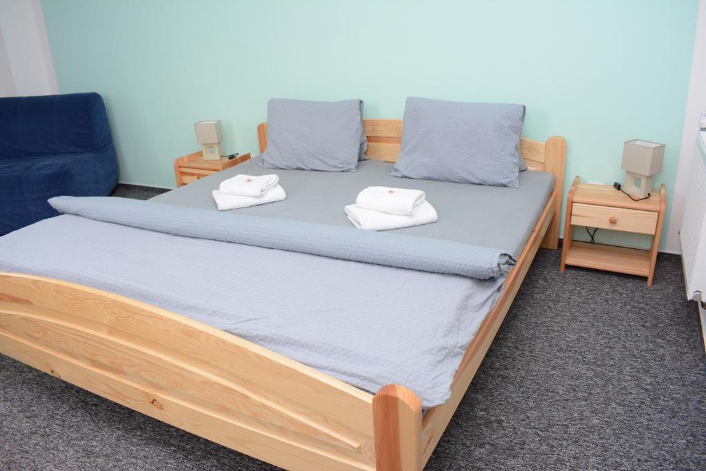 Postel nebo postele na pokoji v ubytování Hotel Andromeda
