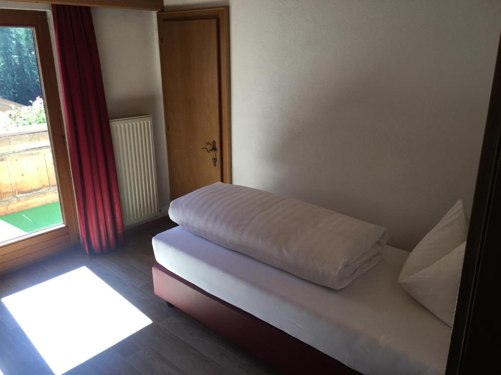 Postel nebo postele na pokoji v ubytování Hotel Edi