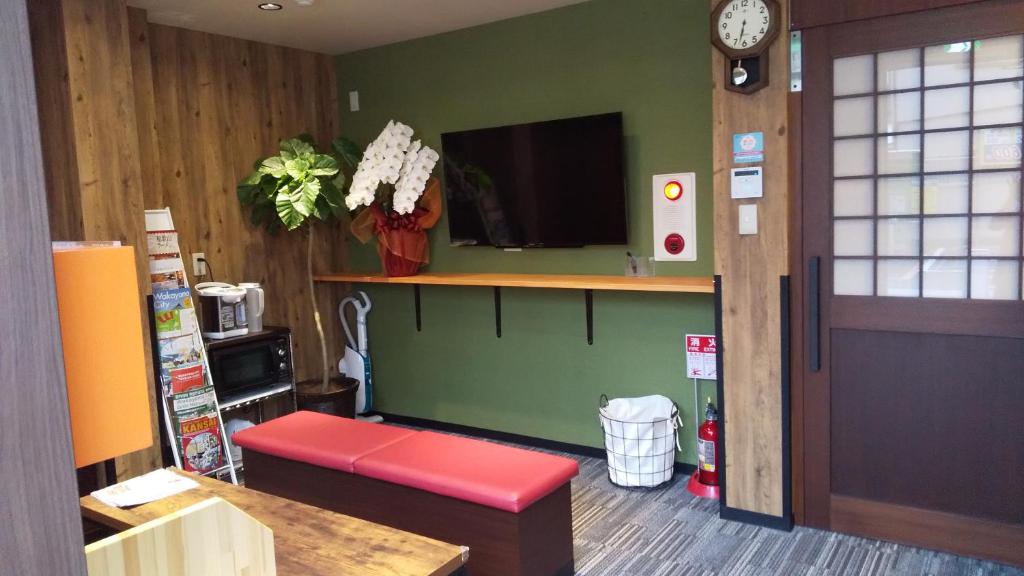 TV a/nebo společenská místnost v ubytování Guesthouse kukuru