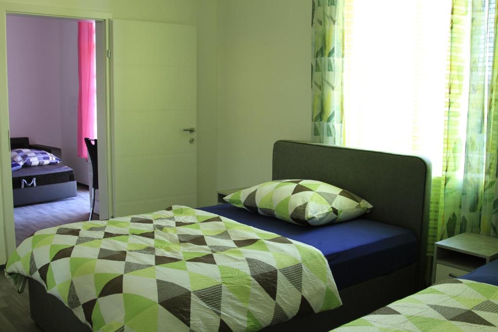 Postel nebo postele na pokoji v ubytování Apartment Fonhauser