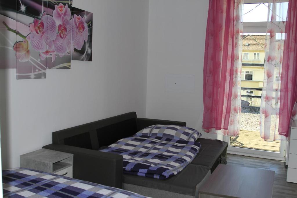 Postel nebo postele na pokoji v ubytování Apartment Fonhauser