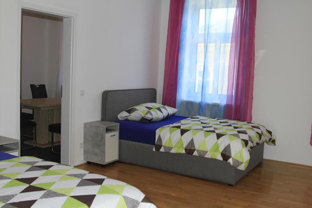 Postel nebo postele na pokoji v ubytování Apartment Fonhauser