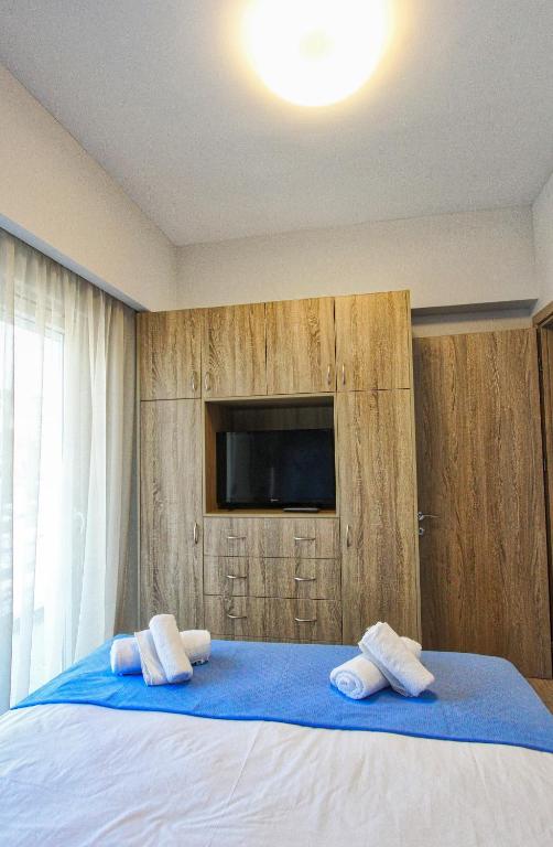 Postel nebo postele na pokoji v ubytování kon&kona kavala
