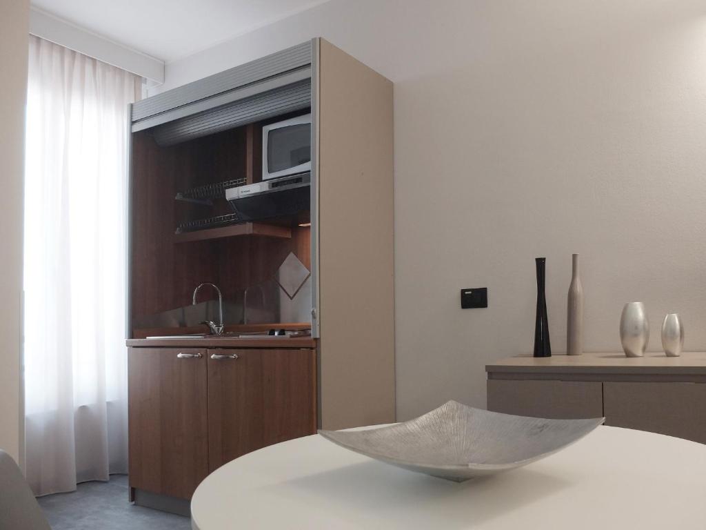 Kuchyň nebo kuchyňský kout v ubytování Hotel Carlton