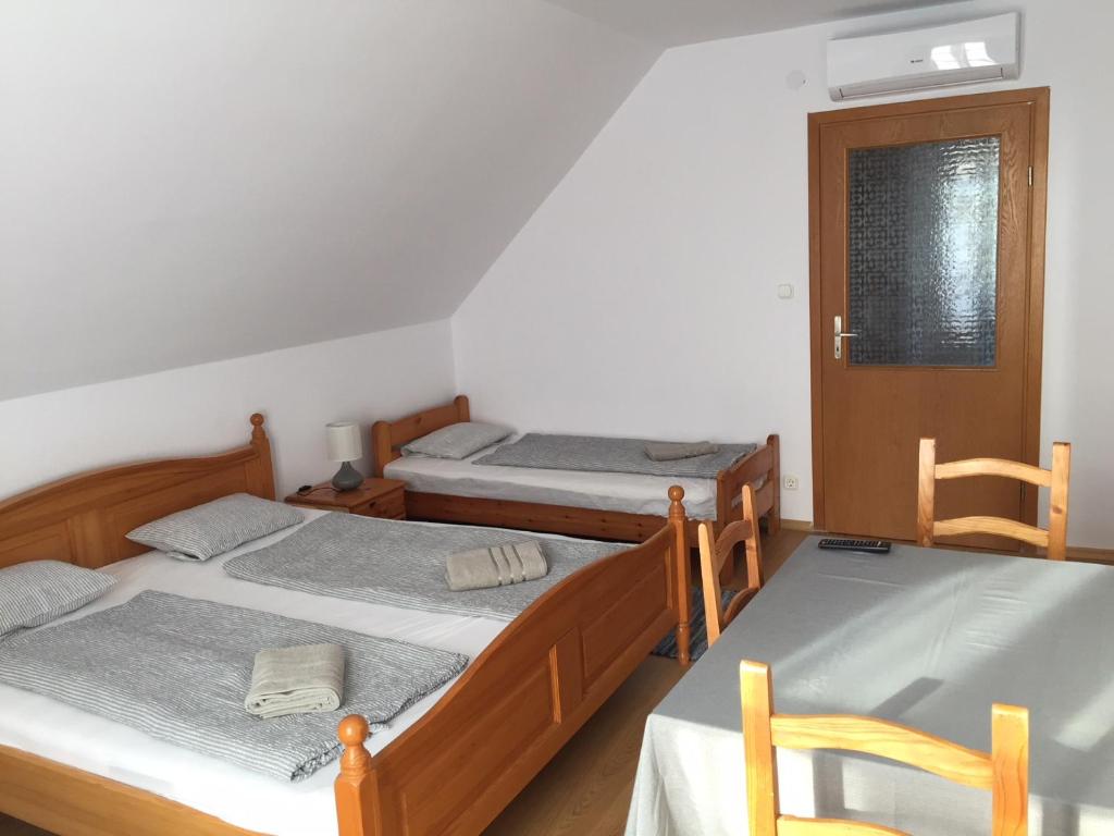 Postel nebo postele na pokoji v ubytování Villa Elysium